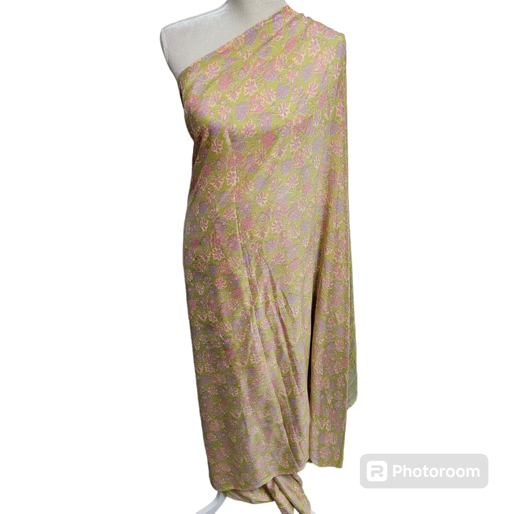 Green polyester saree/sari with purple, pink, and yellow leaves print